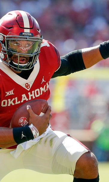 Hurts scores 5 TDs, Sooners roll past West Virginia 52-14